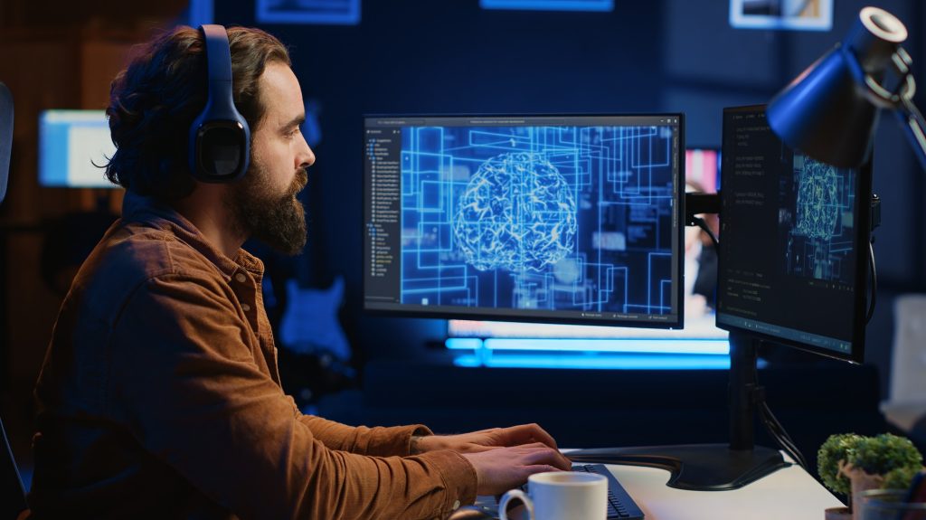 IT expert enjoying coffee and audio podcasts while writing AI code